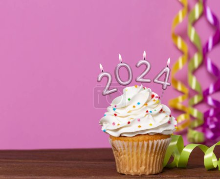 Cupcake With Candles Forming Number 2024 for Happy New Year - New Year Celebration.
