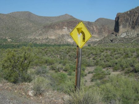 Photo for Road Curves Caution Sign in Arizona Desert. High quality photo - Royalty Free Image