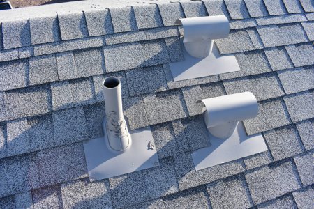 Photo for Roof Vent Penetrations on New Gray Shingled Roof . High quality photo - Royalty Free Image