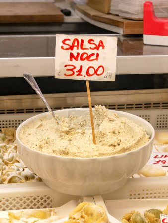 Photo for Bowl of homemade sauce with nuts (salsa noci), with price indication - Royalty Free Image