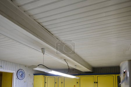 Photo for White panelled ceiling in an old kitchen. - Royalty Free Image