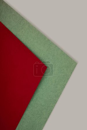 Abstract vertical triangular papers on white background looks like side view of an open book plain vs textured cover