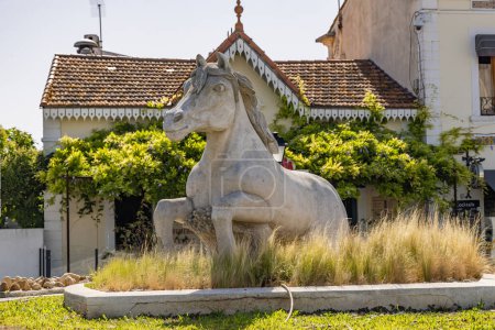 Photo for Saintes-Maries-de-la-Mer, Bouches-du-Rhone, Provence-Alpes-Cote d'Azur, France. July 3, 2022. A sculpture of a Camargue horse in Saintes-Maries-de-la-Mer. - Royalty Free Image