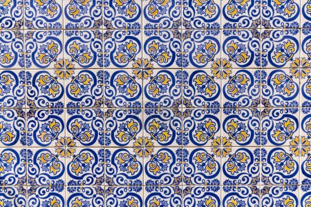 Europe, Portugal, Caminha. Traditional hand painted azulejos tiles on a building in Caminha.