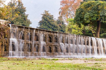 Photo for Srinagar, Jammu and Kashmir, India. October 30, 2022. Artificial waterfall in Mughal Garden. - Royalty Free Image