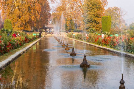 Photo for Srinagar, Jammu and Kashmir, India. October 30, 2022. Decorative fountain in Mughal Gardens. - Royalty Free Image