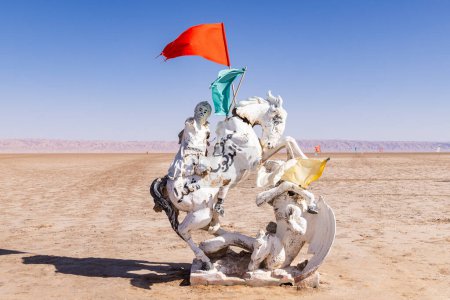 Photo for Chott el Djerid, Tozeur, Tunisia. March 18, 2023. Colorful flags on a sculpture at the Chott el Djerid dry salt lake. - Royalty Free Image