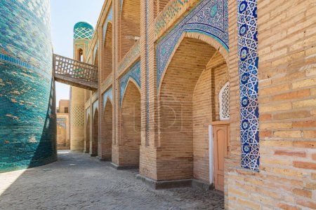 Khiva, Xorazm Region, Uzbekistan, Central Asia. Alley adjacent to the Kalta Minor Minaret in Khiva.