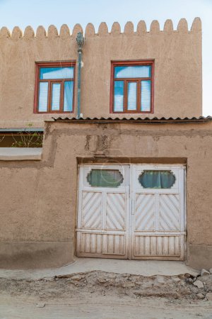 Khiva, Xorazm Region, Uzbekistan, Central Asia. An adobe home in Khiva.