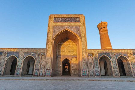 Bukhara, Uzbekistan, Central Asia. Entrance and minaret at the Kalan Mosque in Bukhara.