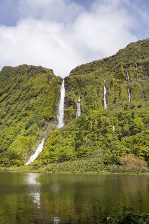 Lagoa Dos Patos, Flores, Azores, Portugal. Waterfalls dropping into Lagoa dos Patos on Flores Island.