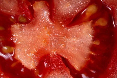 Foto de Textura de tomate como fondo. Un primer plano de un tomate. Macro photo.tomato - Imagen libre de derechos