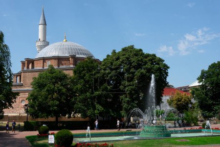 Photo for Sofia, Bulgaria. August 19, 2023. Banya Bashi Mosque,  built over natural thermal spas and famous for its large dome and the minaret. Central Baths Square - Royalty Free Image