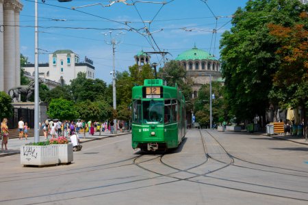 Photo for Sofia, Bulgaria. August 19, 2023. View of an old tramway near Vitosha Boulevard. Sveta Nedelya Cathedral Church in the background - Royalty Free Image