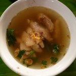 Sop Ayam from Klaten, Central Java, is a clear chicken soup with a rich, savory taste, containing pieces of traditional free-range chicken. It is typically served with white rice for a comforting meal.