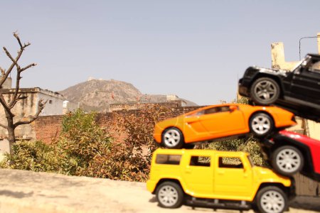 Téléchargez les photos : Jaipur, Rajasthan 16 Jan 2023: Classic fifties scale model toy car from the front view. - en image libre de droit