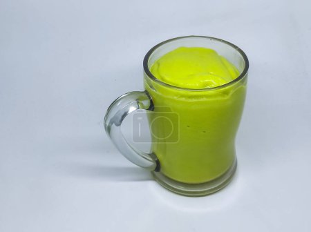 Photo for Jus Alpukat or Avocado Juice. Served in glass on white background. - Royalty Free Image
