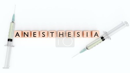 3d representación de bloques de madera deletreando la palabra "ANESTESIA" y jeringa médica