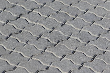 Photo for Gray concrete interlocking paver stones - Royalty Free Image