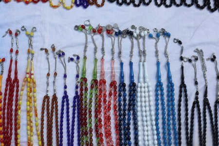 colorful turkish rosaries for sale on the floor