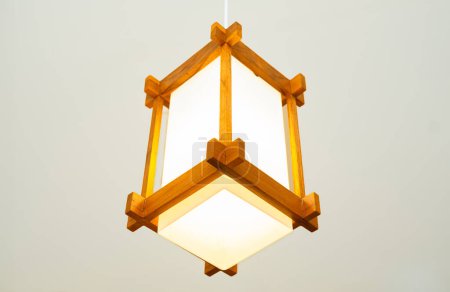 Photo for Vintage Japanese pendant light or solid wood chandelier on white background - Royalty Free Image