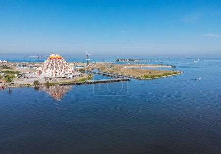 Photo for Aerial view of Masjid 99 Kubah (99 Domes Mosque) and its surrounding, a beautiful Mosque with unique architecture, located in famous destination, Losari Beach, Makassar, South Sulawesi, Indonesia. - Royalty Free Image