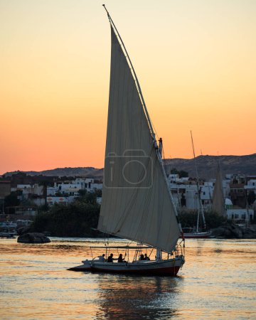Photo for Felucca at dusk on Nile river in Aswan - Egypt. - Royalty Free Image