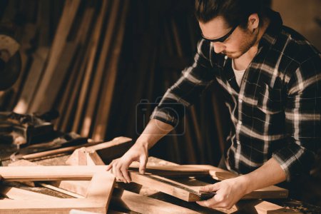 Foto de Professional Carpenter man authentic Handcraft  Wood worker. Joiner or furniture builder home diy projects maker male. - Imagen libre de derechos