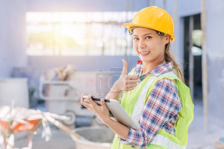 Photo for Portrait engineer woman worker as builder project manager inspector happy smile thumbs up with tablet - Royalty Free Image