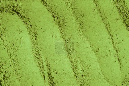 Photo for Green Tea Matcha Powder. Dry green color dust flour or textile dye color chocks powder painting compound background. - Royalty Free Image