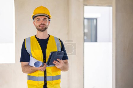 Photo for Professional construction worker engineer male. Real estate house project builder. Smart architect man standing work in construction site. - Royalty Free Image