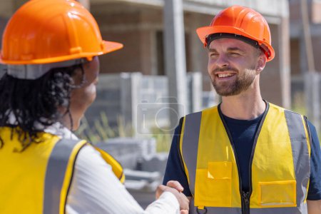 Photo for Happy construction engineer handshaking. Builder man enjoy working job deal contact with partner team smile together. - Royalty Free Image