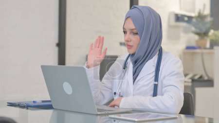 Muslim Female Doctor Doing Video Chat
