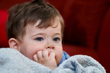 Photo for Portrait of a cute young boy and his safety blankie - Royalty Free Image