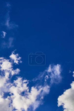 blue sky with partial clound coverage for backgrounds and textures