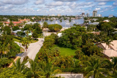 Photo for Aerial drone view of Harbor Beach neighborhood in Fort Lauderdale, Sylvia lake with boats, yachts, luxury houses of different styles luxurious and expensive, blue sky - Royalty Free Image