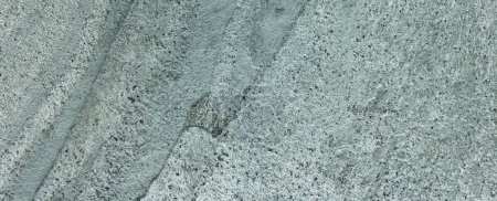 Foto de Panorama panorámico con textura de piedra de color gris. Fondo con superficie rocosa. Encabezado para página web, sitio web, blog, artículo. - Imagen libre de derechos