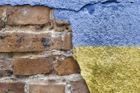 Photo for Ukraine. National flag. Independence Day. Ukrainian symbol is a blue and yellow stripe on an old stone wall. Kievan Rus. National idea and patriotism. copy space. - Royalty Free Image