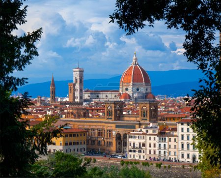 Photo for Florence, Tuscany, Italy. Scenic mountains. Admire the beautiful Florence Cathedral of Santa Maria del Fiore (basilica of St. Mary of the Flowers) through the woods - Royalty Free Image