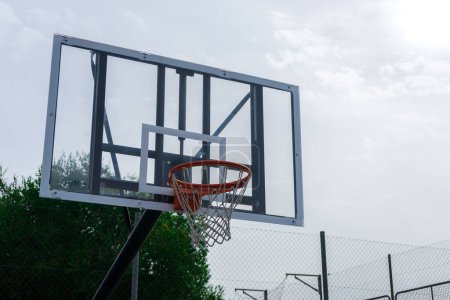 Photo for Horizontal photo of a basketball entering the basket court - Royalty Free Image