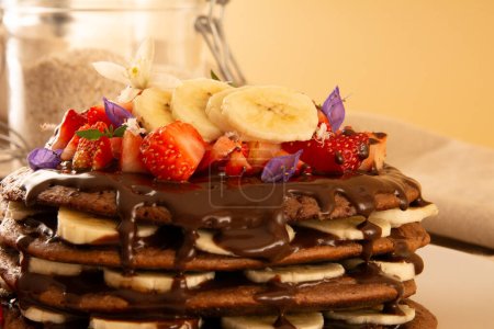Fit Banana Pancake Stack with Strawberry and Hazelnut Cream, horizontal crop closeup