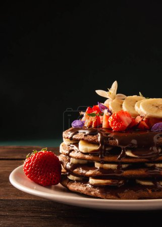 Fit Banana Pancake Stack with Strawberry and Hazelnut Cream, closeup crop