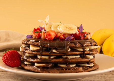 Fit Banana Pancake Stack with Strawberry and Hazelnut Cream, horizontal crop