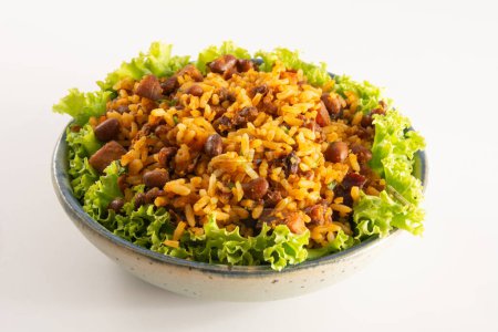 Baiao de Dois traditional Brazilian food made with rice, beans, sausage and rennet cheese
