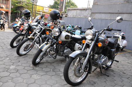 Jakarta, indonesia - june 20.2020 : logo royal enfield motorcycle Parked in front of an auto parts store