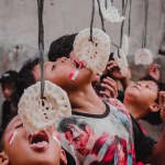 jakarta, Indonesia August 17, 2023 :Jakarta children compete to eat crackers to welcome the Republic of Indonesia's Independence Day