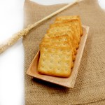 Sugar coated biscuits, sugarless healthy malkist cracker biscuits on white background isolated