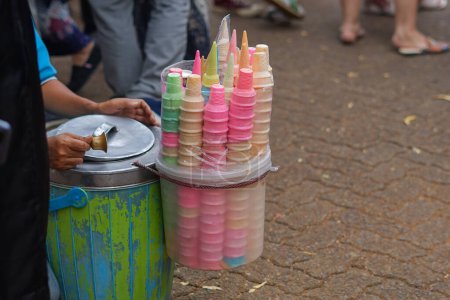 traditional ice cream seller with colorful cones