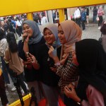 West Java, Indonesia- May, 05, 2024: women in hijabs are karaoke at the karaoke box