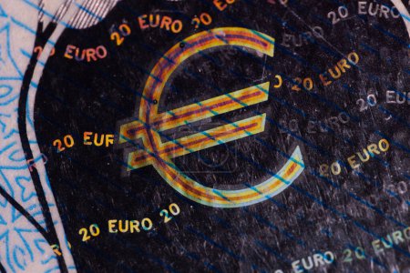 Photo for A twenty euro banknote. Euro money macro close-up. Separate information about the European Union euro cash, which has a nominal value of twenty euros. Savings for the concept of financial freedom. - Royalty Free Image